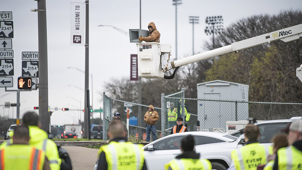 man puts permit into trash