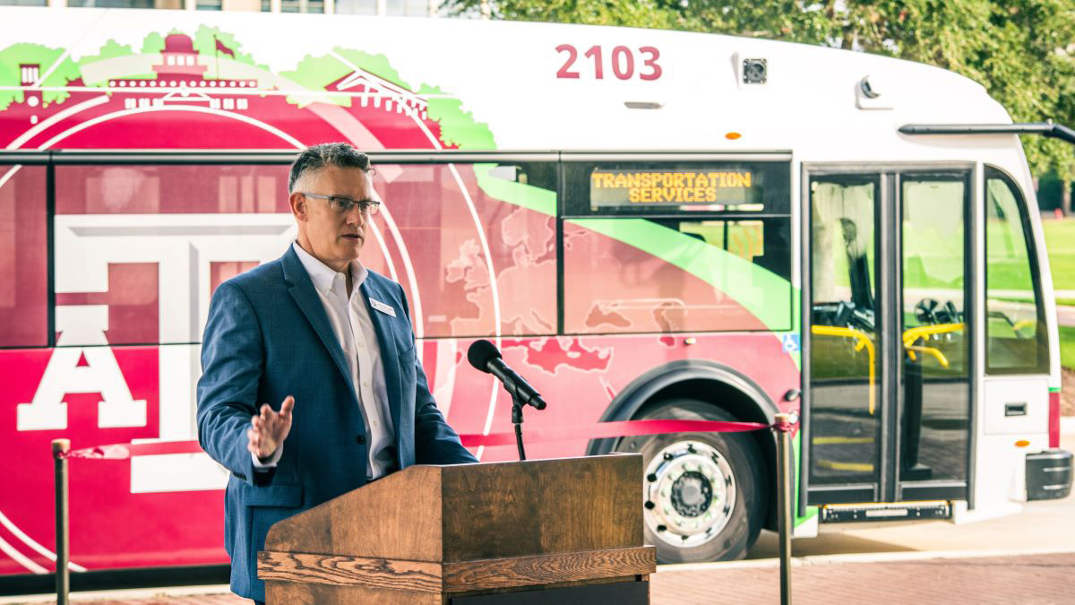 electric bus parked on campus